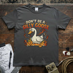Don’t Be a Silly Goose Shirt featuring a cartoon goose and vibrant graphics on a premium quality tee.