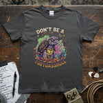 Don’t Be a Turtoasshole Shirt featuring a colorful turtle graphic on a dark grey background.