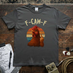 F-CAW-F (Chicken Middle Finger) Shirt displayed on a gray tee, featuring a vibrant chicken design and retro colors.