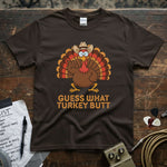 Funny Guess What Turkey Butt Shirt with a turkey graphic, perfect for casual wear and holiday celebrations.