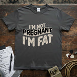 I'm Not Pregnant, I'm Fat Shirt on a gray tee, featuring a humorous message, perfect for casual wear. Lucky spark.