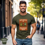 Santa Checked My Pedalboard Twice Shirt modeled by a man in military green, showcasing its premium quality and vibrant design.