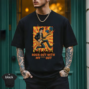Rock Out With My **** Out | Funny Guitar Rock Music T-Shirt in black worn by a man, showcasing vibrant rock-themed design.