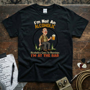 I’m Not An Alcoholic I’m At The Bar | Funny Drinking Humor T-Shirt with cartoon character holding a beer.
