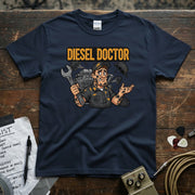 Diesel Doctor | Funny Diesel Mechanic Workwear T-Shirt featuring a mechanic with a wrench and diesel engine design.