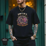 Model wearing a black shirt with the design 