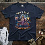 Don't Be a Thundercunt Shirt featuring a vibrant graphic design of a powerful woman.