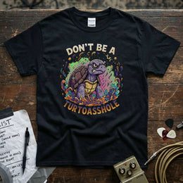 Don't Be a Turtoasshole Shirt featuring a colorful graphic turtle design on a black tee.