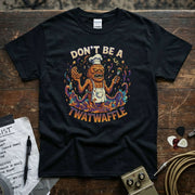 Don’t Be a Twatwaffle Shirt featuring a colorful graphic design on a black premium quality tee.