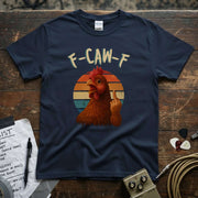 F-CAW-F (Chicken Middle Finger) Shirt featuring a vibrant chicken graphic on a navy blue tee.