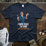 I Know What I’m Doing I Just Don’t Know Why | Funny Mechanic T-Shirt featuring a cartoon mechanic with a wrench.
