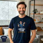 I Know What I’m Doing I Just Don’t Know Why | Funny Mechanic T-Shirt worn by smiling man in a navy tee at home.
