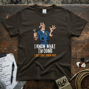 I Know What I’m Doing I Just Don’t Know Why | Funny Mechanic T-Shirt featuring a comical mechanic with a wrench.