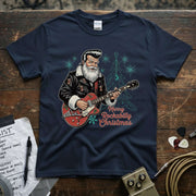 Merry Rockabilly Christmas Shirt with a guitar-wielding Santa on a navy tee, vibrant design, perfect for the festive season.