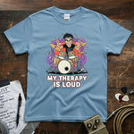 My Therapy Is Loud | Funny Drummer Musician Shirt featuring a drummer with vibrant design on a light blue tee.
