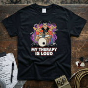 My Therapy Is Loud | Funny Drummer Musician Shirt featuring a drummer character on a black tee.