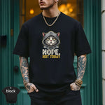 Man wearing Nope, Not Today Shirt with a playful cat design, showcasing the black premium quality tee.