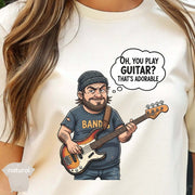 Oh You Play Guitar That’s Adorable | Funny Bass Player Shirt featuring a cartoon bassist with a playful expression.