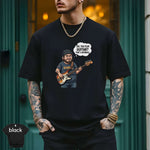 Oh You Play Guitar That’s Adorable | Funny Bass Player Shirt worn by a musician with tattoos, showcasing a playful design.