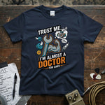 Trust Me I’m Almost a Doctor for Cars | Funny Mechanic T-Shirt design featuring a wrench and mechanic graphics.