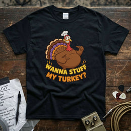 Wanna Stuff My Turkey Shirt featuring a fun turkey graphic on a black tee, perfect for Thanksgiving celebrations.